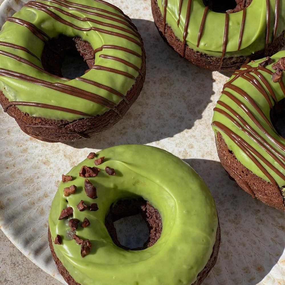 Chocolate donuts with matcha coverage